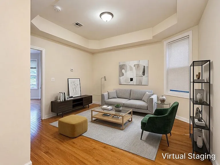 Unique residence features 3 bedrooms, 2 full bathrooms, and a versatile bonus lower-level living space that can be used as a recreation room, home office, gym, guest suite, or potential third bedroom.